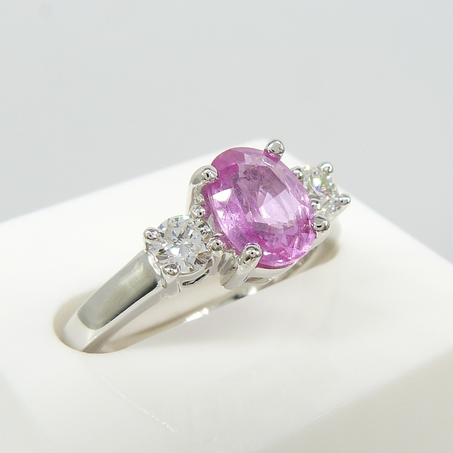 1.50 carat pink sapphire and 0.35 carat diamond 3-stone dress ring in 18ct white gold - Image 7 of 8
