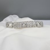 Fine quality, Art Deco bracelet set with 7.45 carat marquise, round and baguette diamonds.