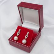 Art Deco-style 9ct yellow gold pearl and diamond droplet earrings, articulated