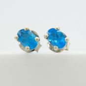 Pair of neon blue apatite gemstone stud earrings in sterling silver