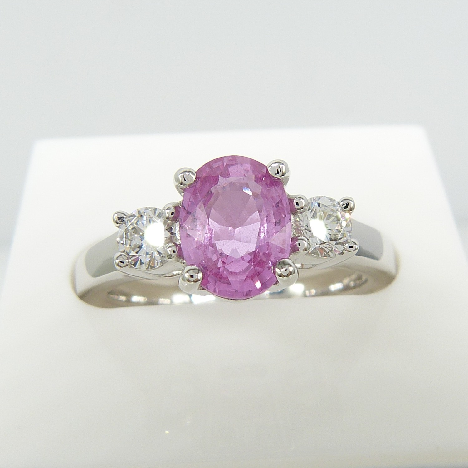 1.50 carat pink sapphire and 0.35 carat diamond 3-stone dress ring in 18ct white gold - Image 2 of 8