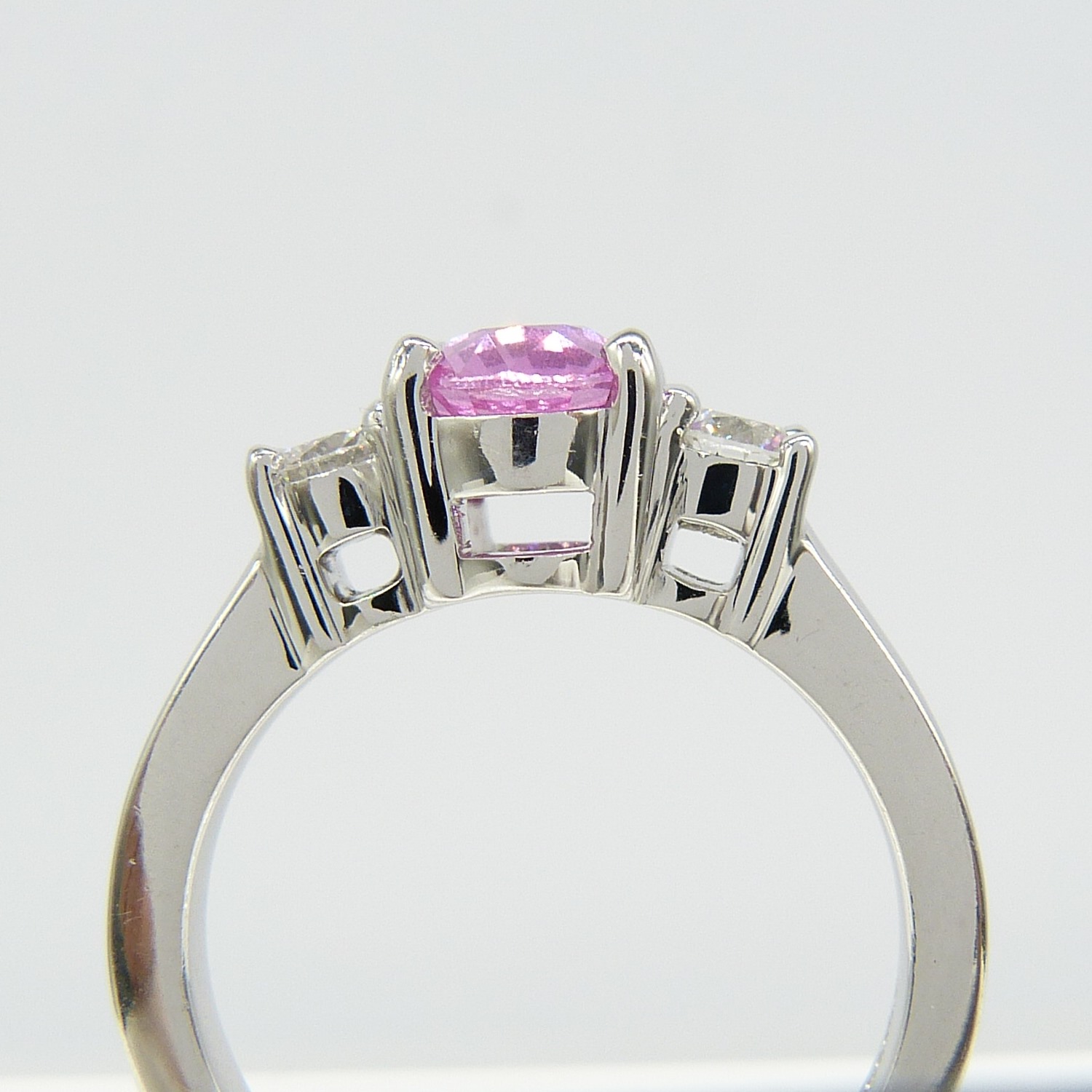 1.50 carat pink sapphire and 0.35 carat diamond 3-stone dress ring in 18ct white gold - Image 6 of 8