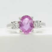1.50 carat pink sapphire and 0.35 carat diamond 3-stone dress ring in 18ct white gold