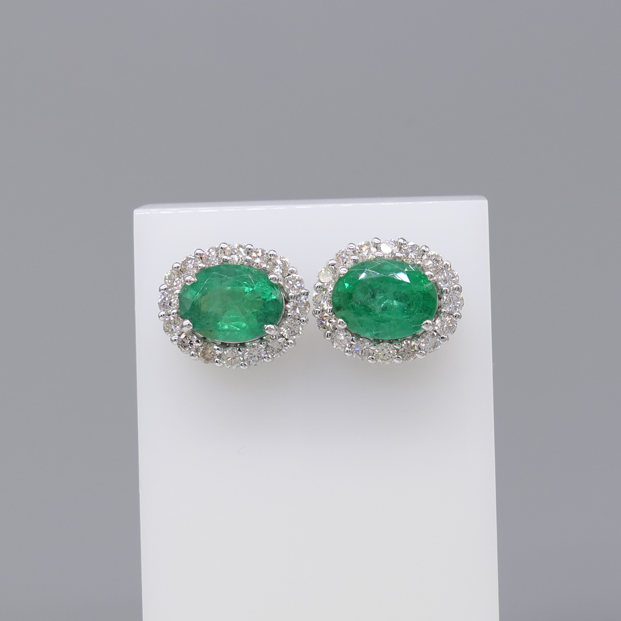 Pair of 18ct white gold oval emerald and diamond cluster ear studs, boxed - Image 6 of 7