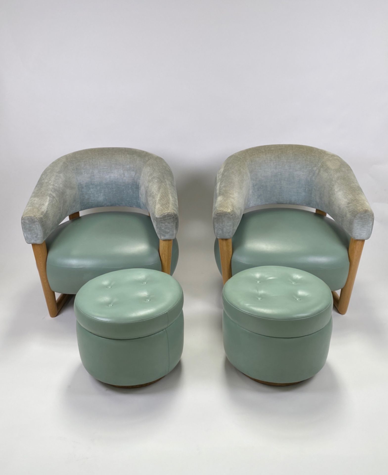 Pair of Teal Leather Lounge Chairs with Pouffes