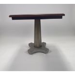 Mahogany square occasional table on a single column with four feet.