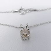 18ct white gold 0.74 carat diamond solitaire pendant with chain, boxed.