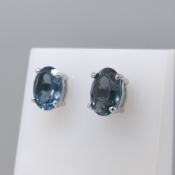 Pair of London blue topaz gemstone stud earrings in sterling silver.