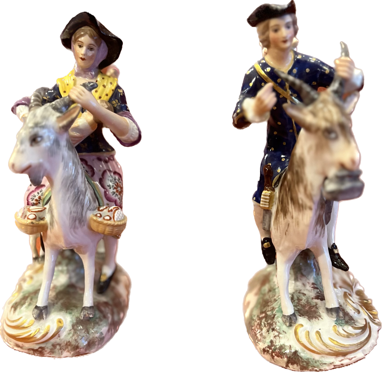 A fine pair of porcelain figures of the tailor and his wife, high quality figures.