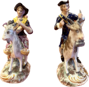 A fine pair of porcelain figures of the tailor and his wife, high quality figures.