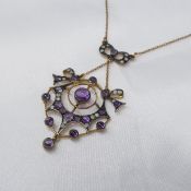 Victorian-style cabochon amethyst and diamond necklace in yellow gold and silver.