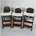 Trio of wooden and faux leather high chair