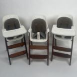 A Trio of Wooden and Faux leather high chairs
