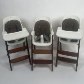 A Trio of Wooden and Faux leather high chairs