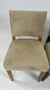 A Set of Four Wooden and Fabric Dining Chairs