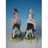 Pair Staffordshire Pottery Girl/Boy On Goats, With Flower Baskets