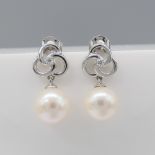Pair Of Pearl & Diamond Pinwheel Droplet Earrings In White Gold