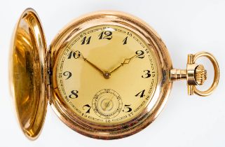 Sprungdeckel- Taschenuhr um 1920/ 30; vergoldeter Staubdeckel, beide Hauptdeckel in 585er Gelbgold