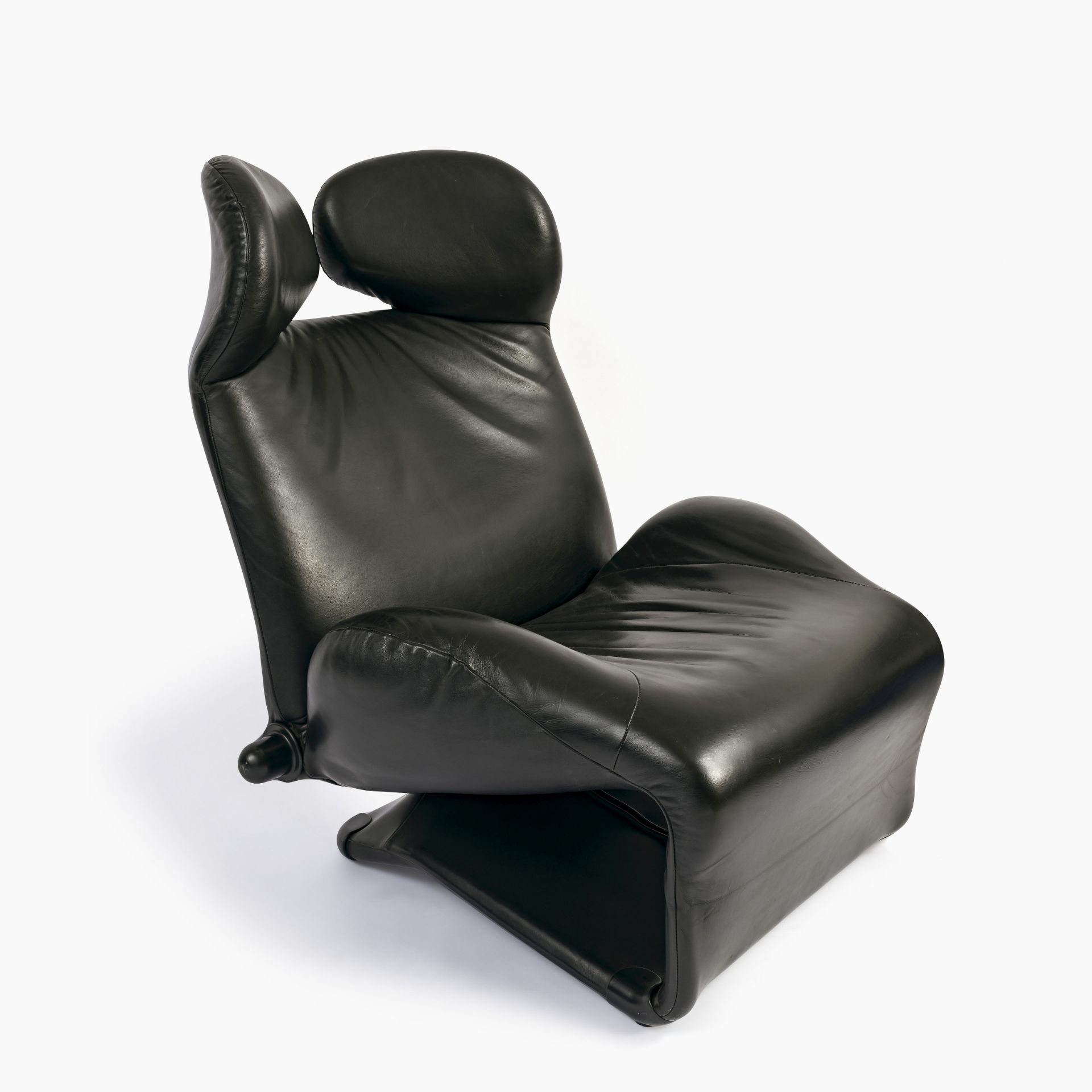 A Wink armchair, model 111