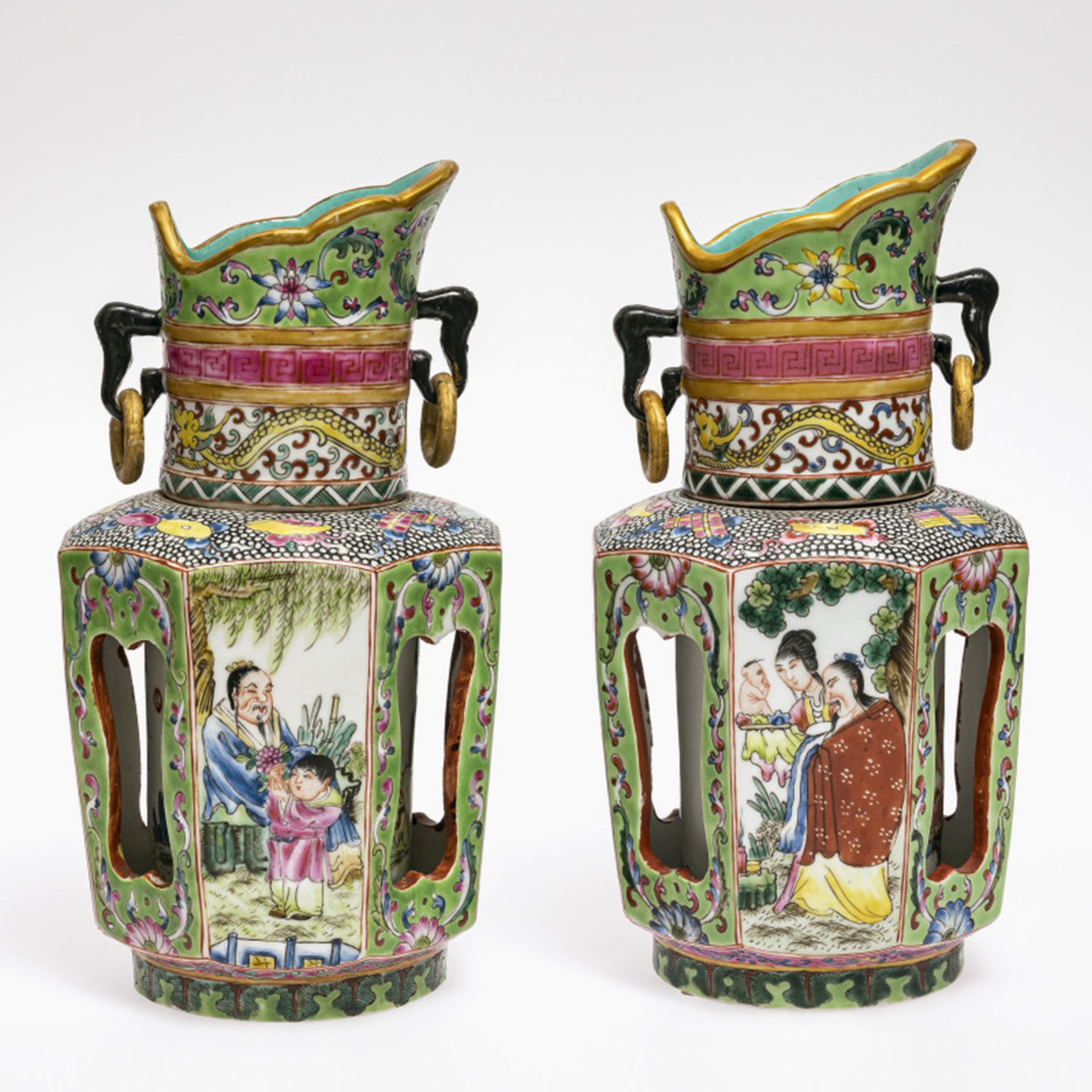 A pair of revolving vases