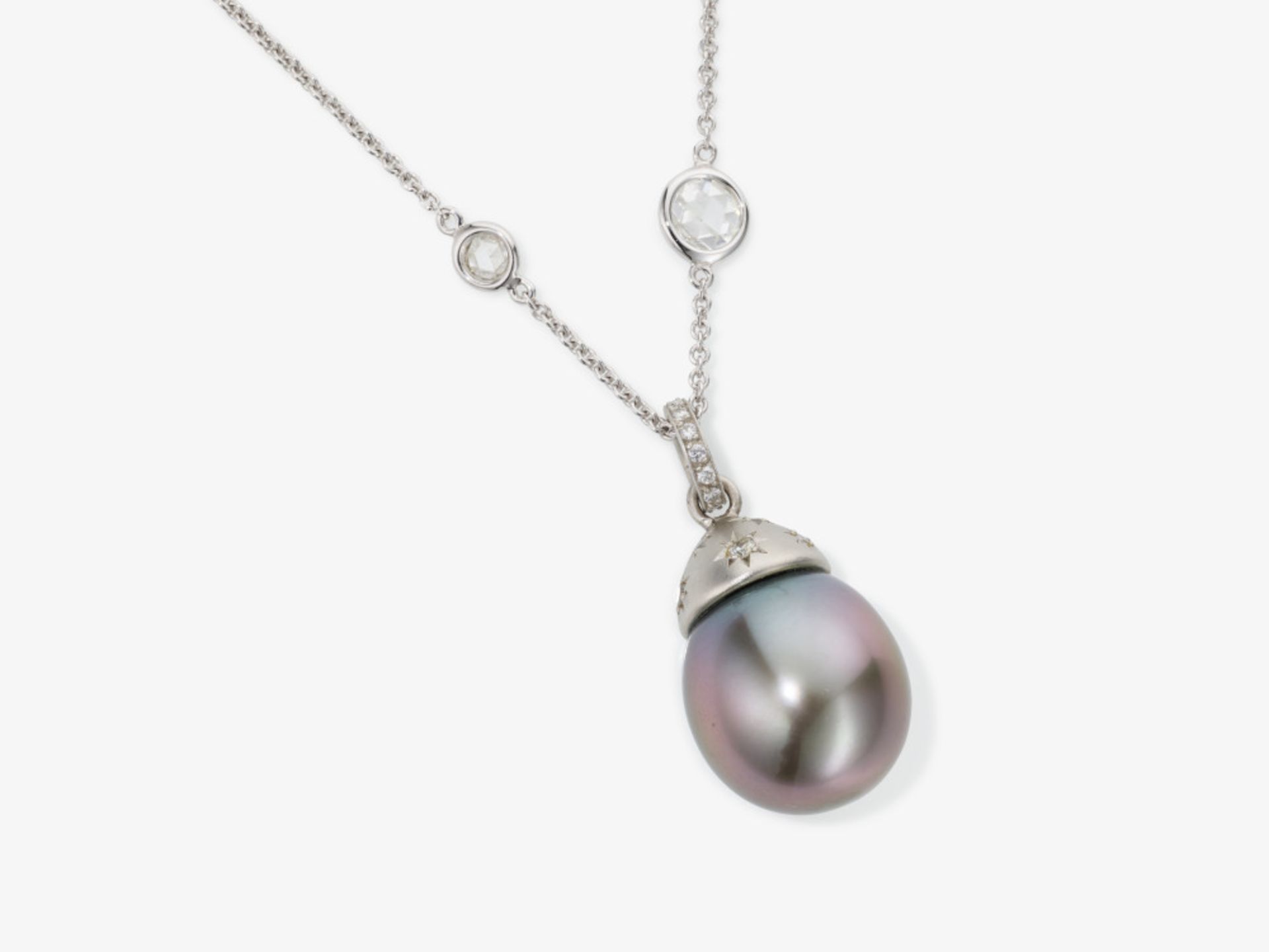 A delicate link chain necklace decorated with diamond roses and a South Sea Tahitian cultured pearl 