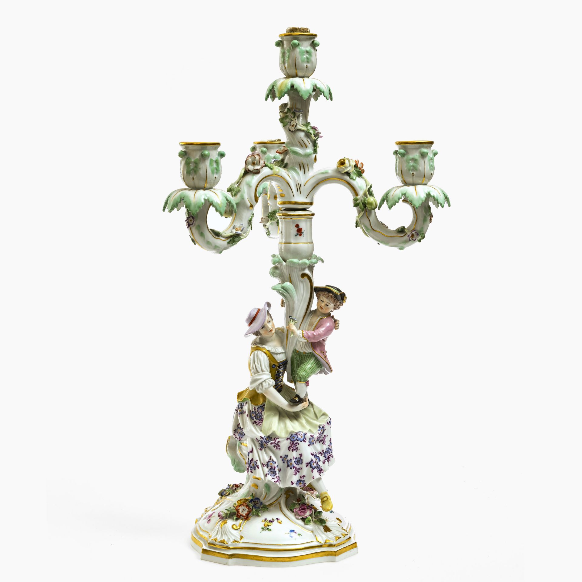 A four-light girandole with gardener figures