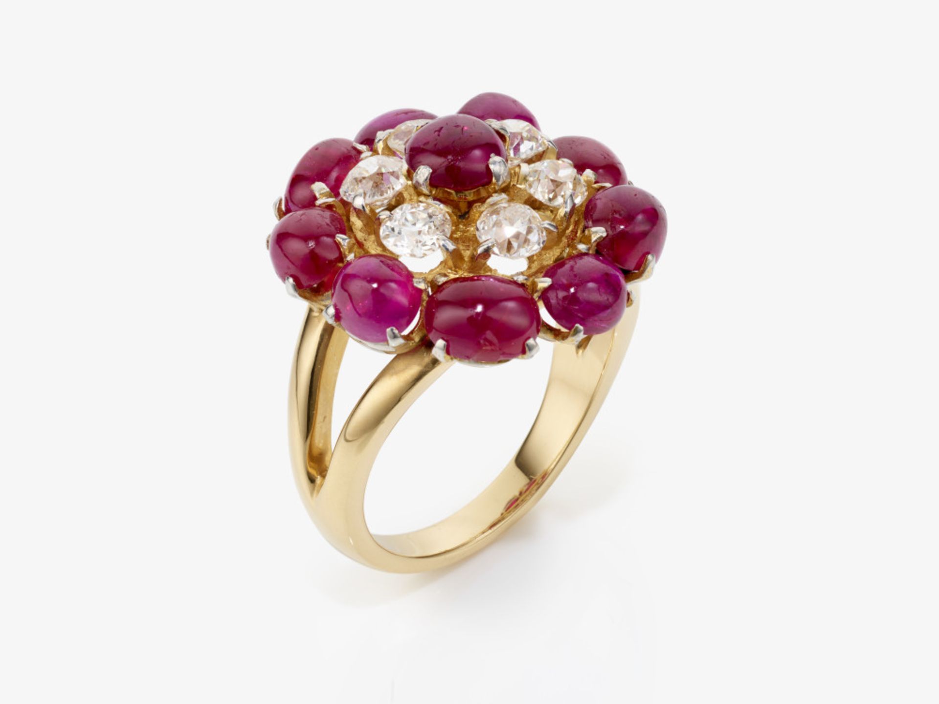 A cocktail ring decorated with fine rubies and old-cut diamonds