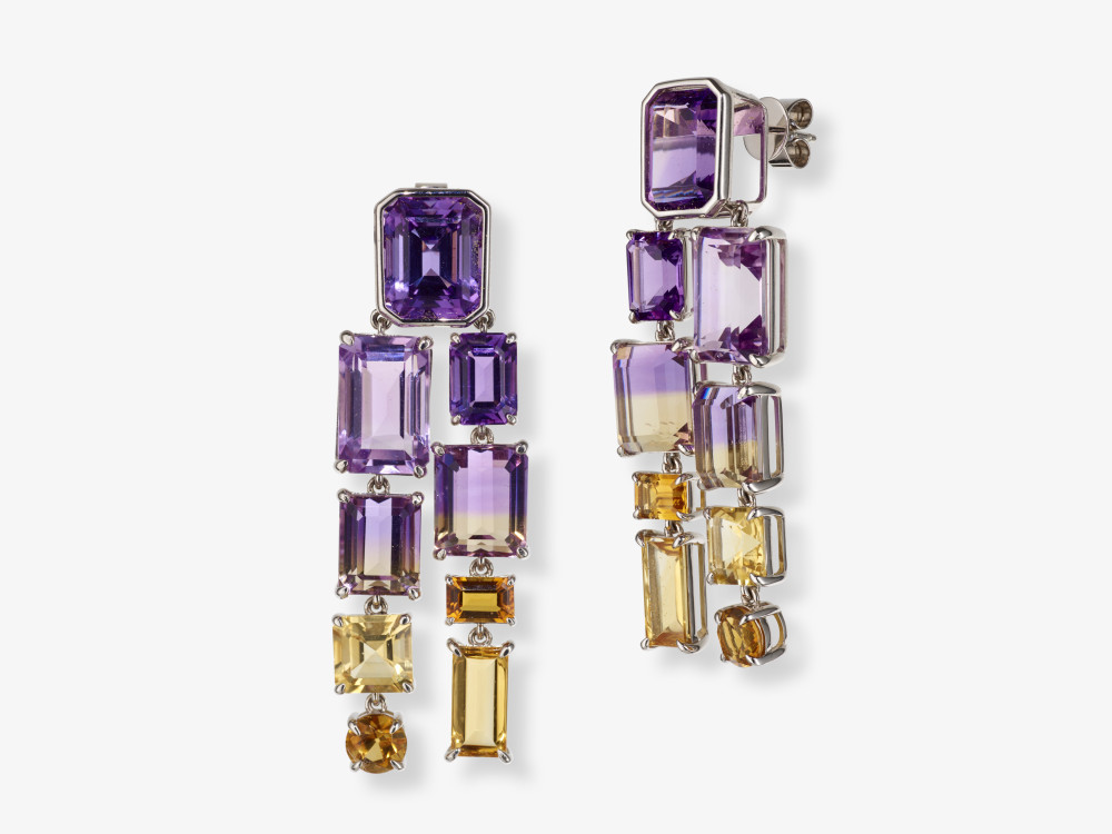 A pair of unique stud earrings decorated with amethyst and ametrines