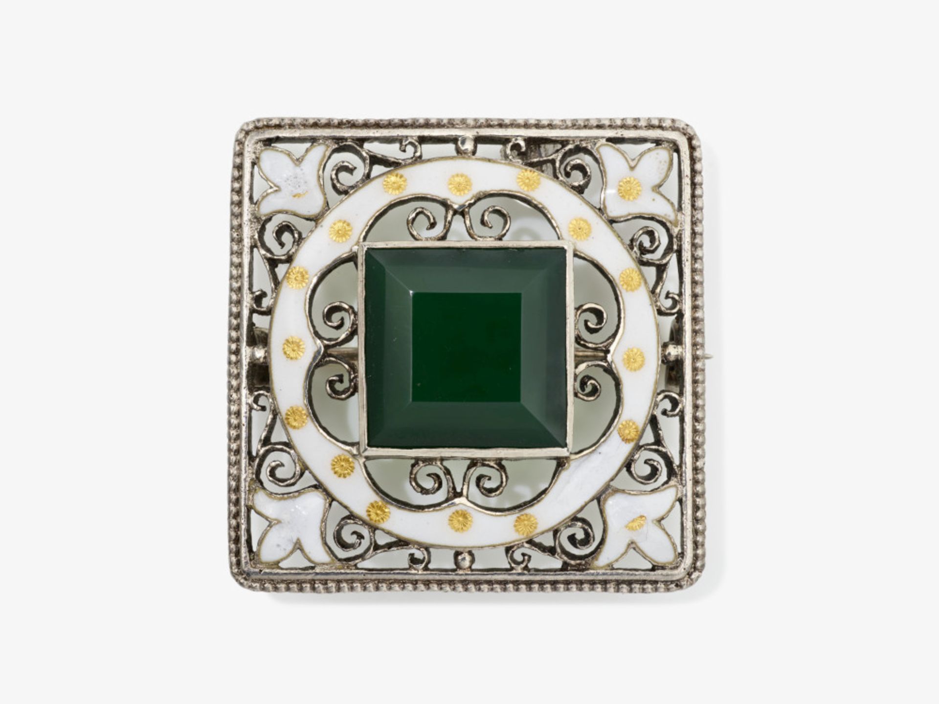 A brooch with green glass stone and white enamel - Image 3 of 4