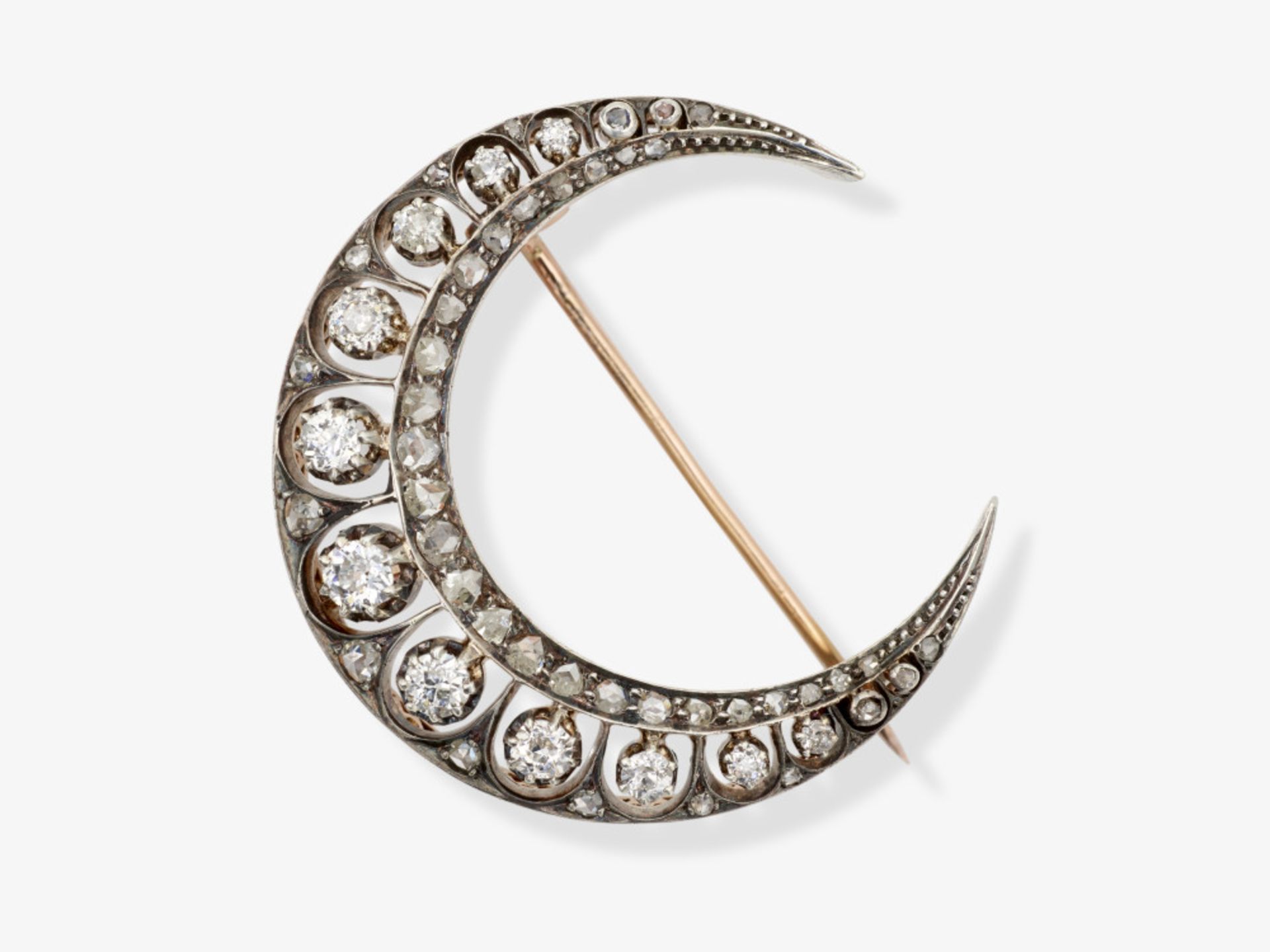 A crescent moon brooch with diamonds