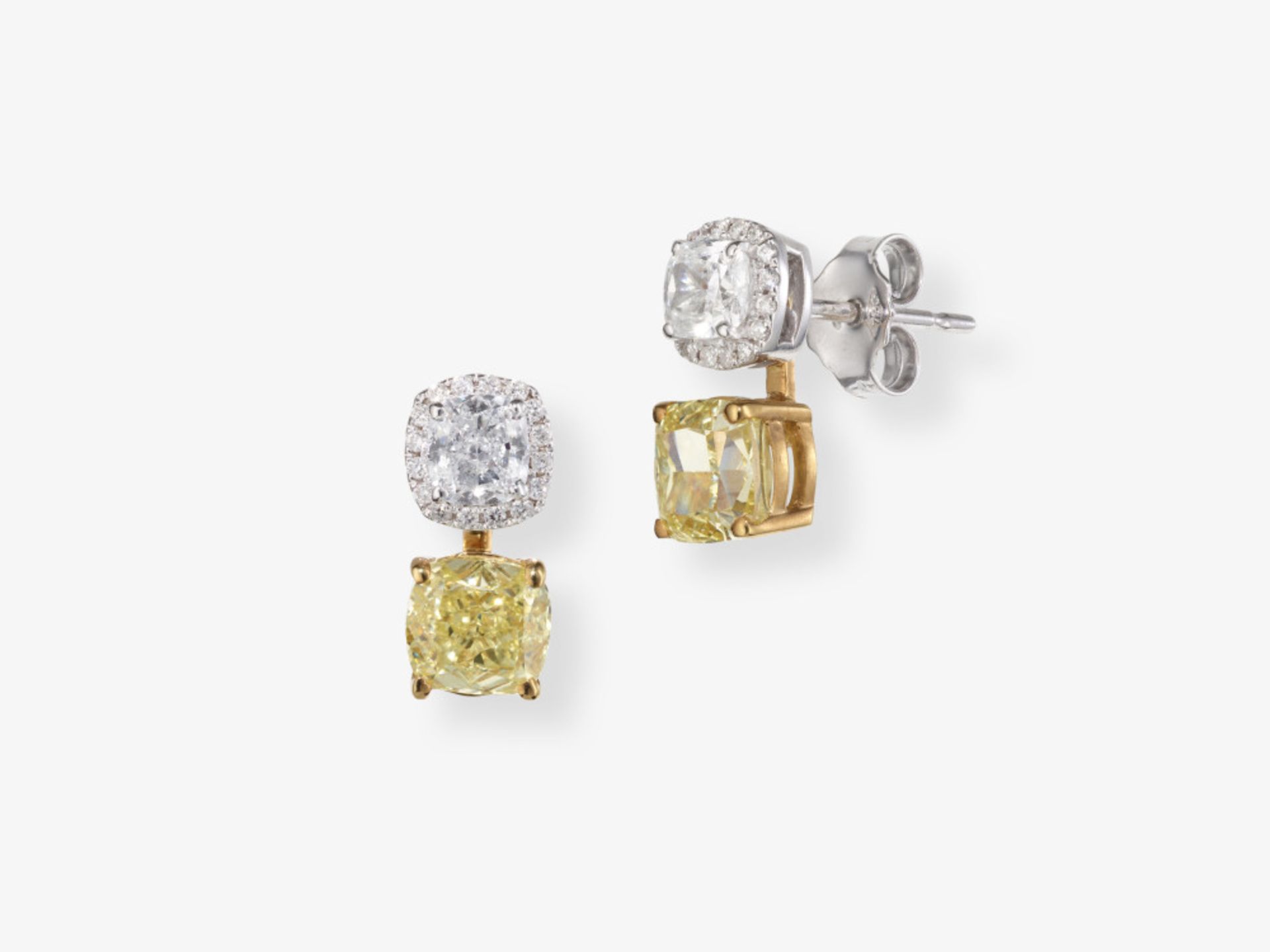 A pair of convertible stud earrings decorated with white and fancy yellow diamonds and brilliant-cut