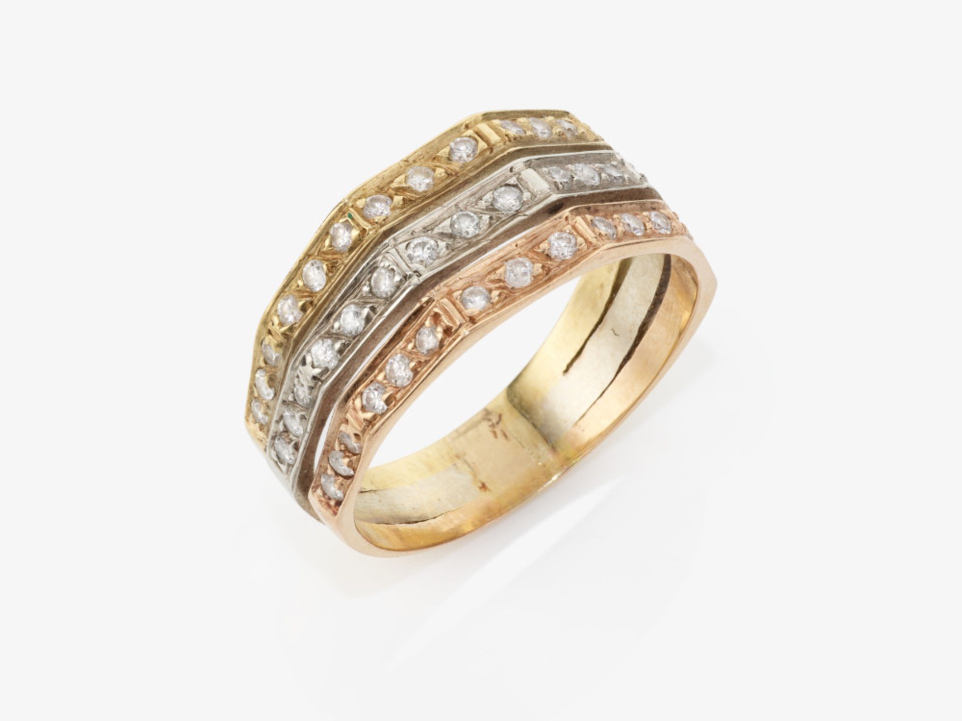 A three-piece ring with brilliant-cut diamonds