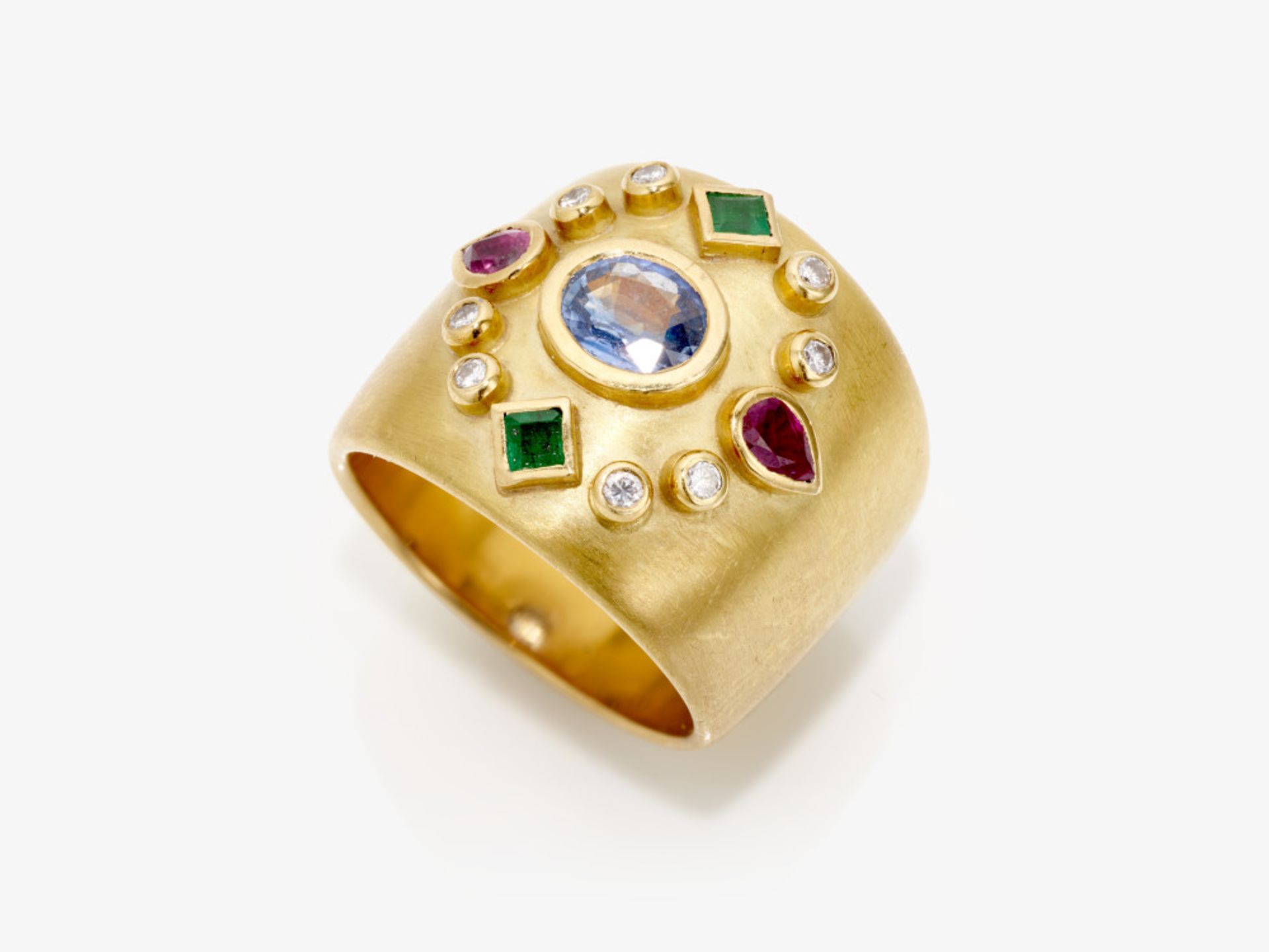 A ring with sapphire, rubies, emeralds and brilliant cut diamonds