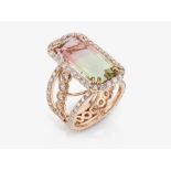 A ring with a tourmaline and brilliant-cut diamonds