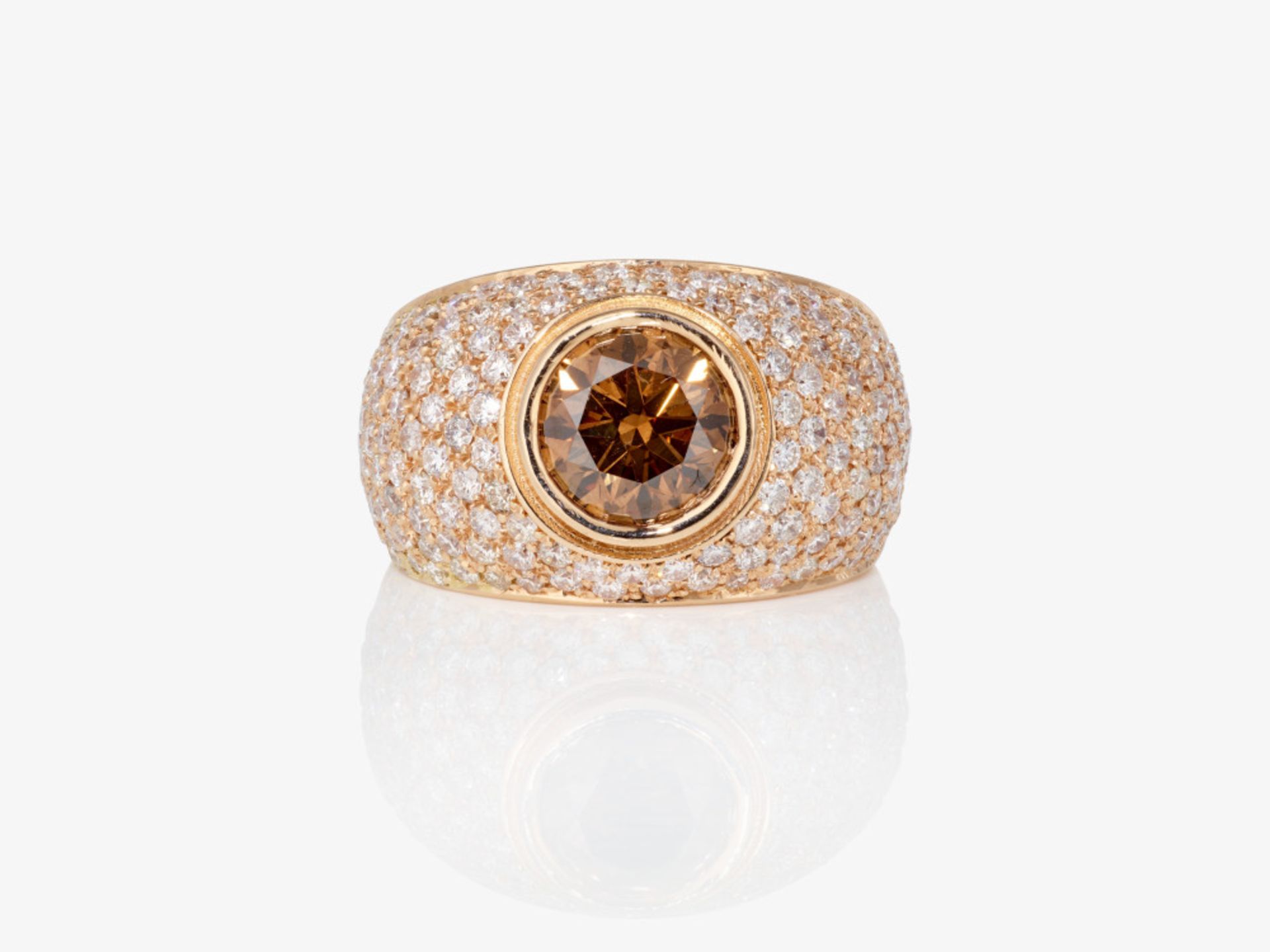 A cocktail ring decorated with a fancy deep orangy brown brilliant-cut diamond and white brilliant-c - Image 2 of 2