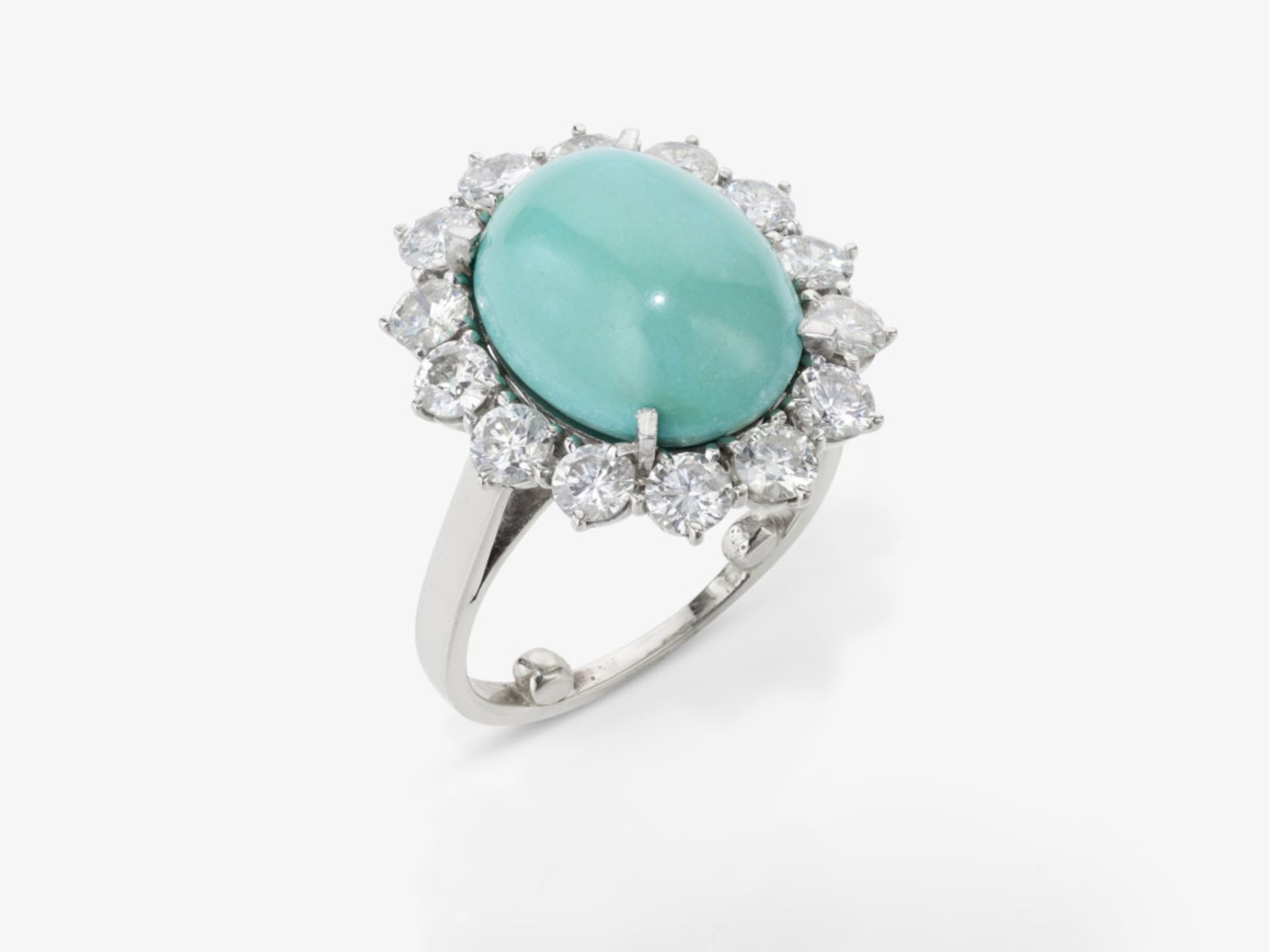An Entourage ring with a turquoise and brilliant-cut diamonds