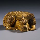 Qing dynasty copper gilt Rui beast paperweight