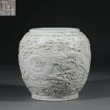 Qianlong inscription white glaze relief dragon jar