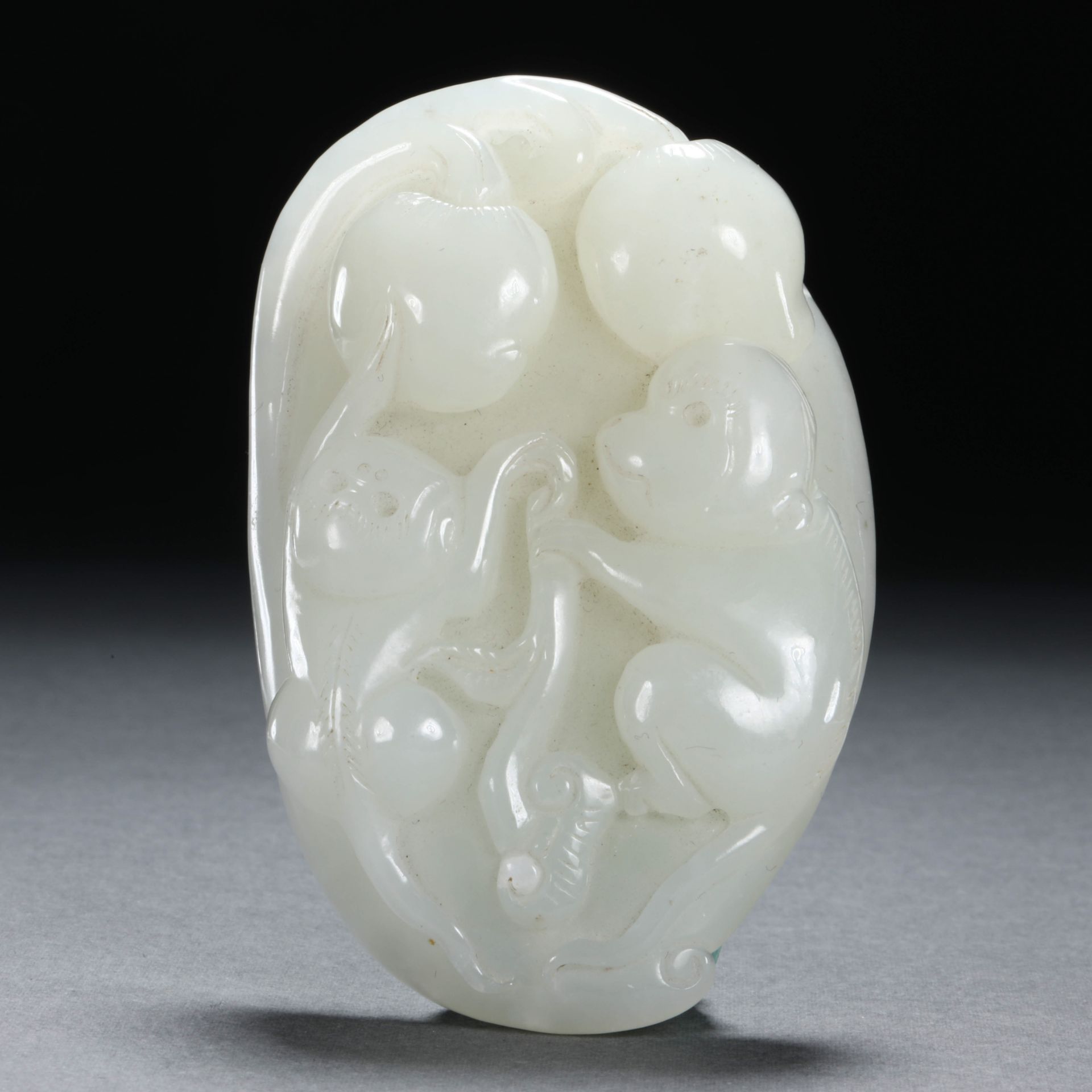Hetian jade carved monkey pendant