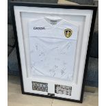 LEEDS UNITED FRAMED 18/19 SHIRT, HAND SIGNED BY THE TEAM