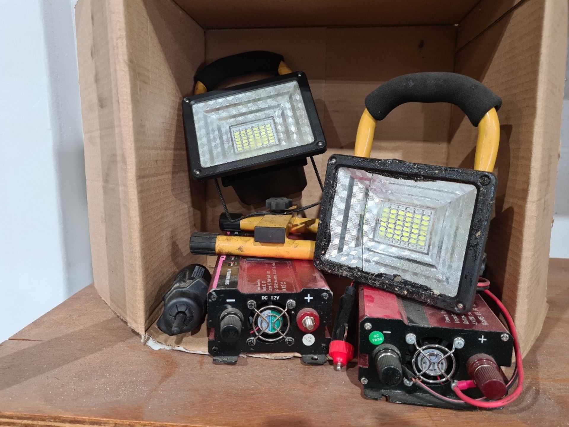Box of LED site lights and power inverters.