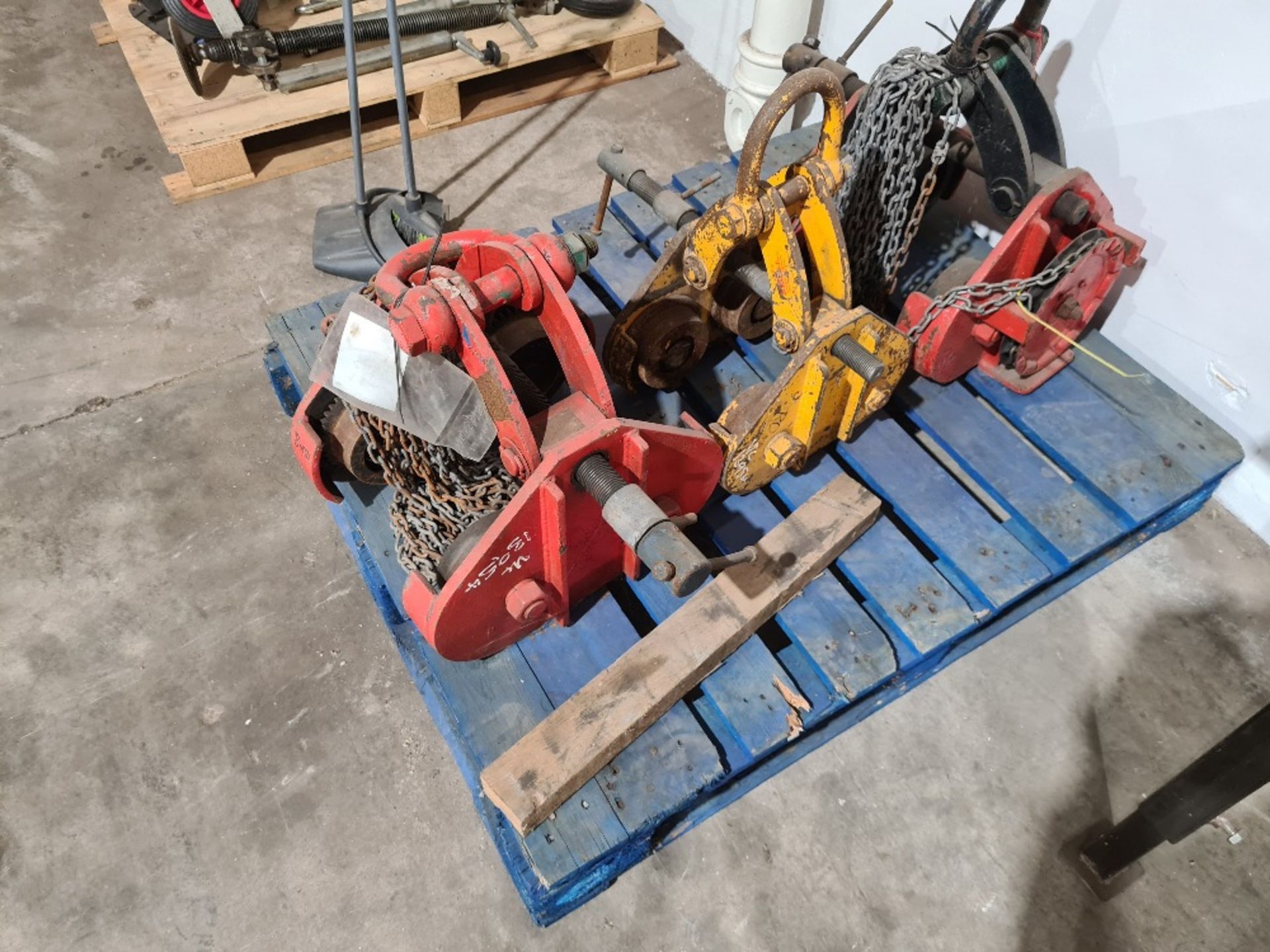 Pallet of girder pulleys.