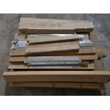 Pallet of new, unused aluminium rulers and cutting edges.