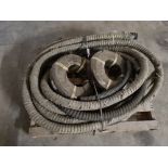 Pallet of exhaust hose and fuel pipe.