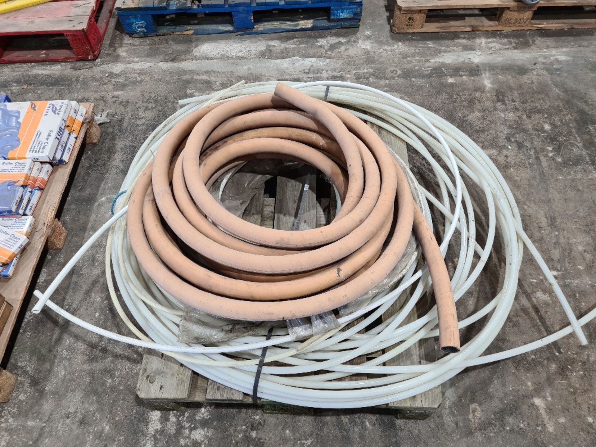 Pallet of miscellaneous hose / pipe.