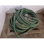 Pallet of green hose.