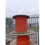 2 x drums of 6.9mm monofilament duct rope (one new), orange.