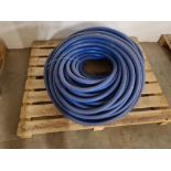 Pallet of blue hose.