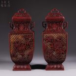 A set of Chinese Qing dynasty lacquerware carved vases