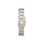 A LADY'S STAINLESS STEEL CARTIER WRISTWATCH, tank, white face with Roman numerals, three spare